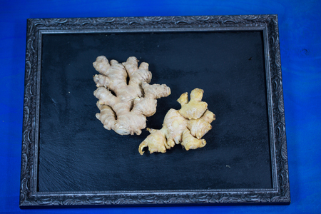 ginger on black background, healthyの写真素材