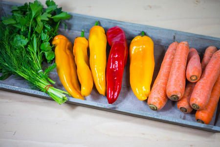 carrots and peppers on trayの写真素材