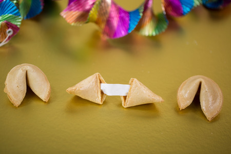 Lucky biscuits on golden background, forutune cookieの写真素材