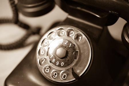 old telephone on wooden tableの写真素材