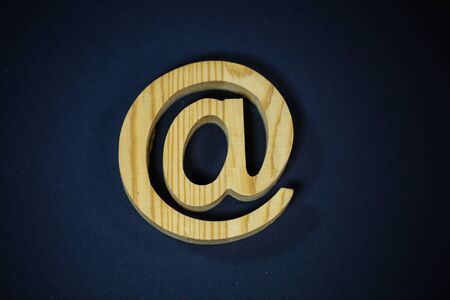 at sign on black background, symbol,の写真素材