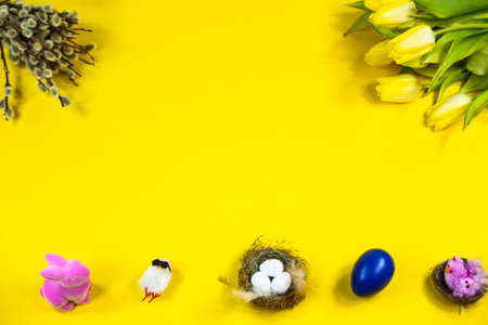 Tulips, Easter egg, Easter basket on yellow background, palm kitten