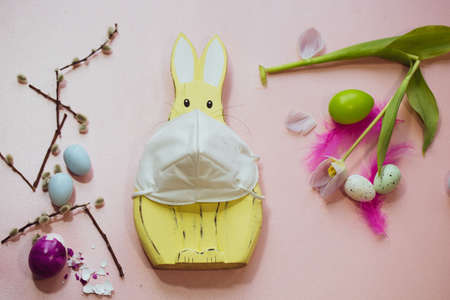 Easter bunny with mask in the Corona timeの写真素材