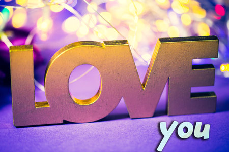 Love you with bokeh, written. Postcard, backgroundの写真素材