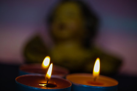 Candles with angels in the background, Christmas card, postcardの写真素材