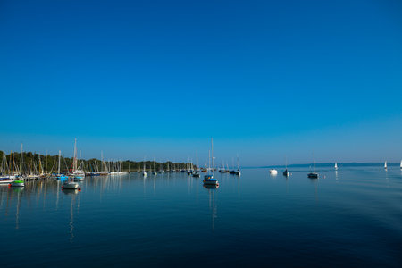 sailboats on lake ammer, bavaria, blues skyの写真素材