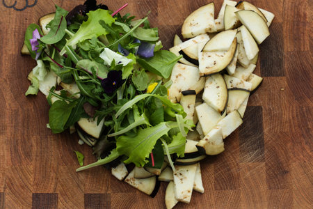 Lettuce heart with lettuce and eggplant on a wooden backgroundの写真素材