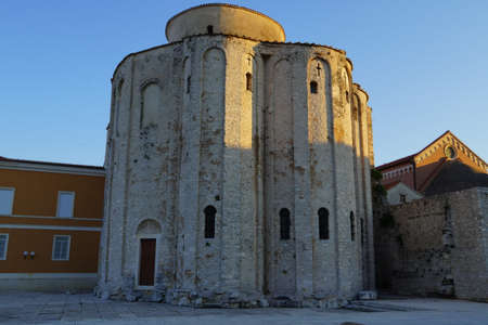 ZADAR, CROATIA - July 23, 2020: St. Donat church, forum and Cathedral of St. Anastasia bell tower in Zadar, Croatia. Zadar is famous tourist spot at Adriatic sea coast in Dalmatia.のeditorial素材