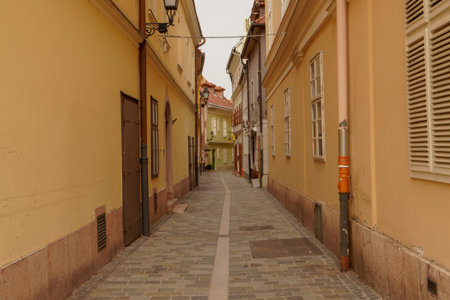 Gyor, Hungary. City in Western Transdanubia region. Old town street.の写真素材