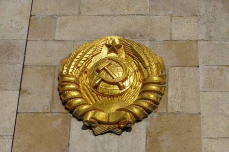 Budapest, Hungary, November 3, 2023: State emblem of the former Union of Soviet Socialist Republics depicting a hammer and sickleのeditorial素材
