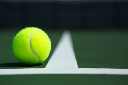 Tennis Ball on the Court Close upの写真素材