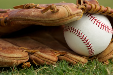 New Baseball in a Glove Close Upの写真素材