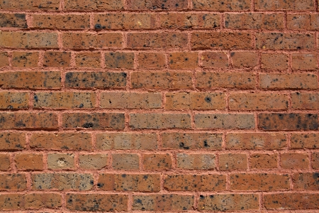 Worn Early 19th Century Brick Wall for Industrial Backgroundの写真素材