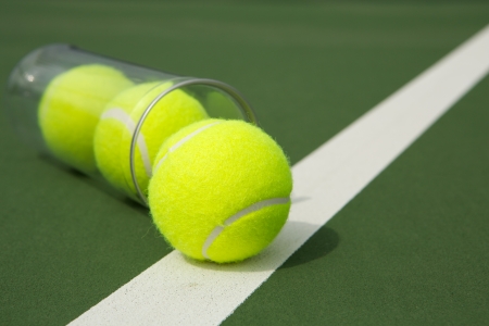 Tennis Balls from a Canister on the Courtの写真素材