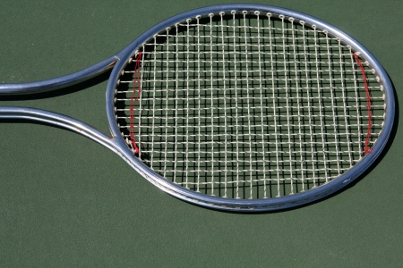 Tennis Racket on the court with room for copyの写真素材