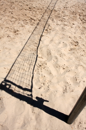 Shadow of a VolleyBall Net in the Sandの写真素材