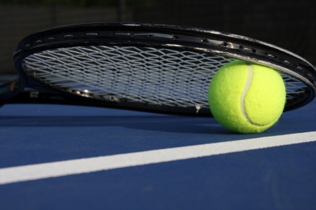 Tennis Ball and Racket on the courtの写真素材