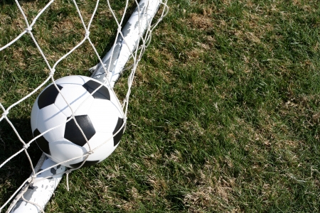 Soccer ball in the goal scoringの写真素材