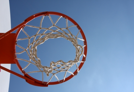 Outdoor Basketball Hoop against a blue skyの写真素材