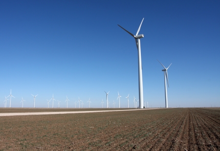 Country field full of Wind turbines for clean energyの写真素材