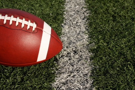 American Football near the yard lineの写真素材