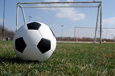 Soccer ball near a goalの写真素材