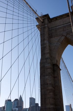 Angled view of the cables of Brooklyn Bridge with Lower Manhattan beyondの写真素材