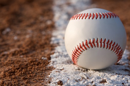 New Baseball on the Chalk Line of the Infieldの写真素材