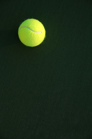 Tennis Ball on the Court with room for copyの写真素材