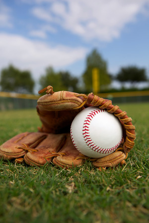 New Baseball in a Glove in the Outfieldの写真素材
