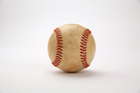 Worn Baseball  isolated on whiteの写真素材