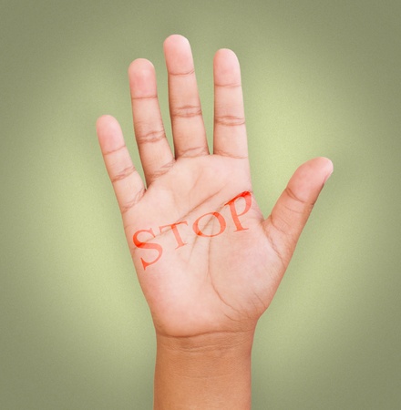 Stop text in little handの写真素材