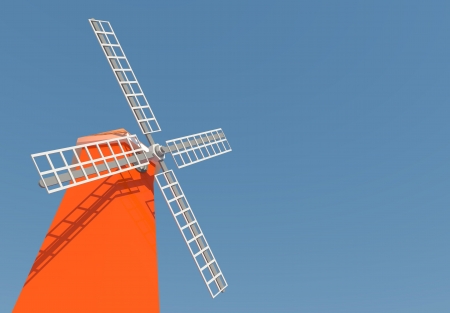 The older windmill tower with clear skyの写真素材