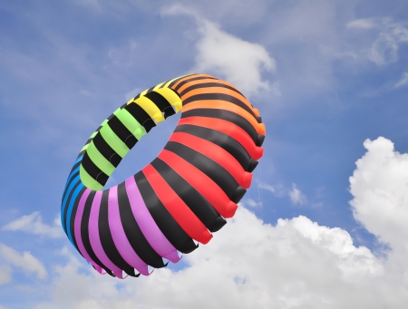 Colorful Of big kite circle with blue skyの写真素材