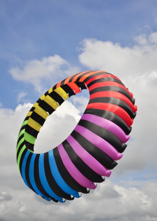Colorful Of big kite circle with blue skyの写真素材