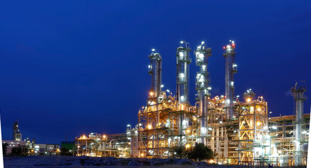 Night scene of Petrochemical industrial plant with blue sky