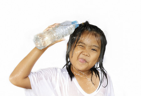 Asian children have fun for Pour water  body の写真素材
