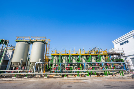 Chemical tank in factory whit blue skyの写真素材
