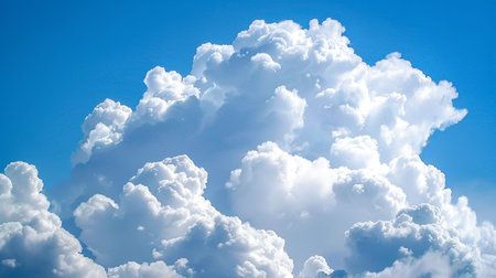 Blue sky background with tiny clouds. White fluffy clouds in the blue sky.