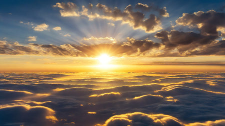 Sunset Over a Stunning Blue Sky with Sunbeams Piercing the Cloudsの写真素材