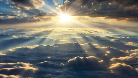 Sunset Over a Stunning Blue Sky with Sunbeams Piercing the Cloudsの写真素材
