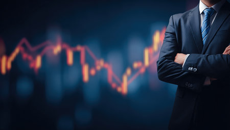 Confident businessman against stock market graph backgroundの写真素材