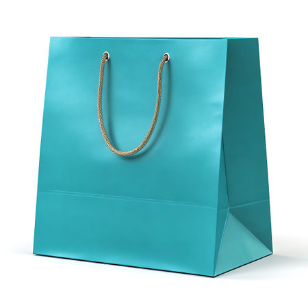 A single, rectangular teal shopping bag with a smooth, matte finish. It features a braided rope...
