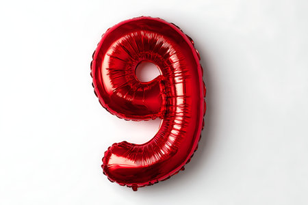 Shiny red number 9 balloon on white background. High resolution image with clear details and vibrant...