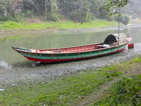 Boat on the river in the village of Mae Hong Son, Thailandの写真素材
