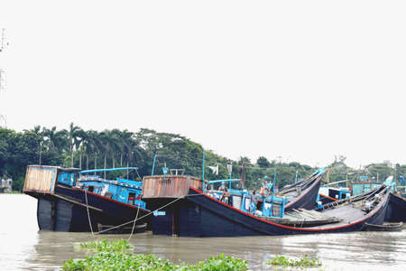 River Side Local People Lifestyle,River View, Traditional Small Boat with cloudy sky .The photo was taken from Shitolokkha River, Narayanganj,Rupgonj on 24th september 2020.のeditorial素材