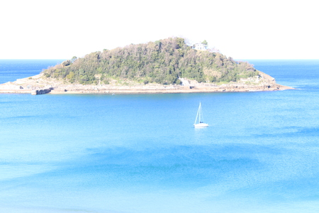 Beautiful view of blue sea,boat and islandの写真素材