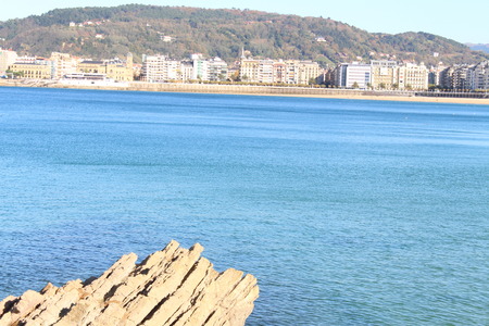 View of rock,sea,and island areaの写真素材