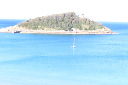 Beautiful view of island,boat and blue waterの写真素材