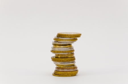 Coins arranged in small stackの写真素材